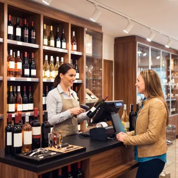 Wine store POS system at checkout counter