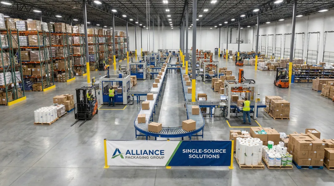 Alliance Packaging Group warehouse facility showing strapping equipment and packaged inventory in stock