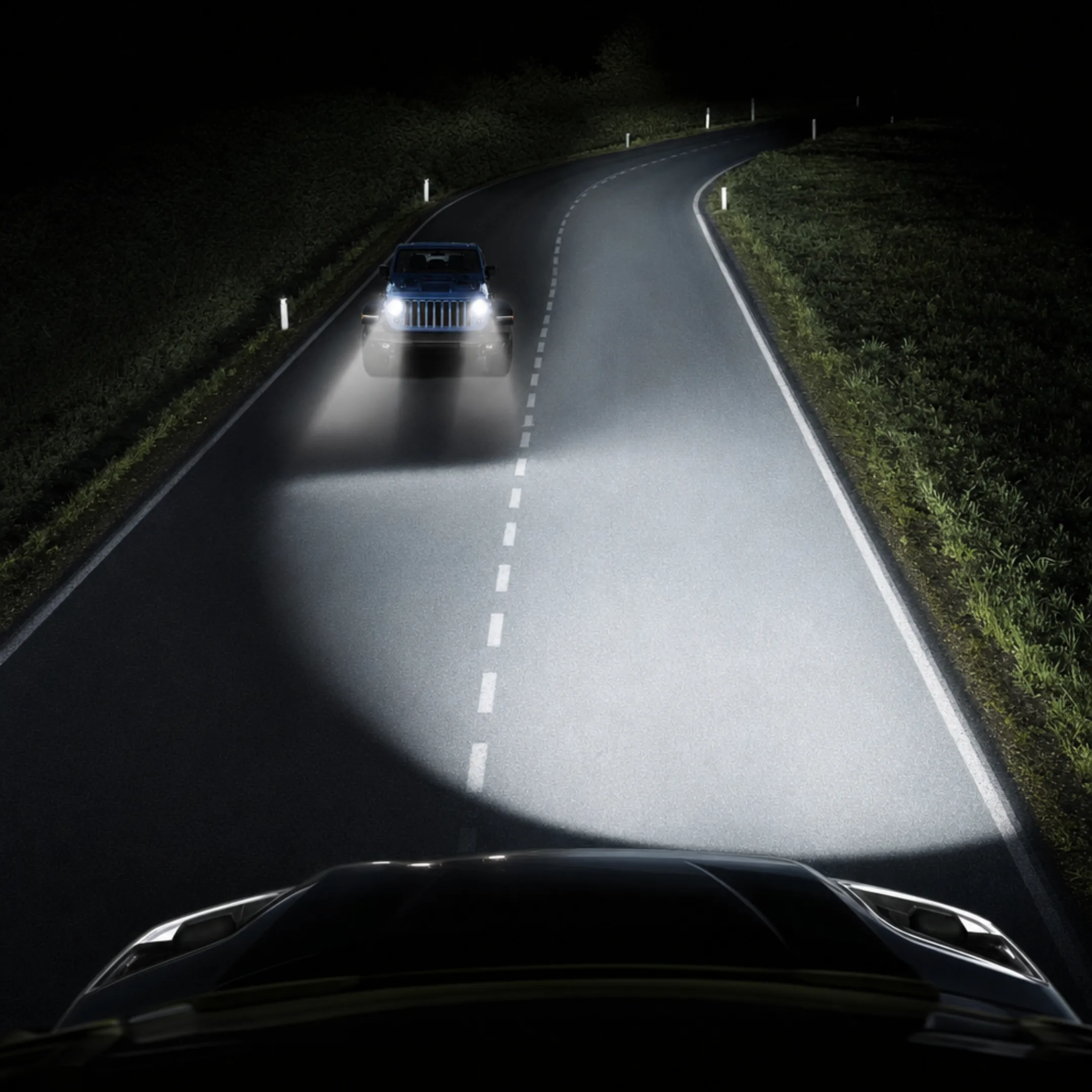 Automotive headlamp assembly showing adaptive driving beam light distribution