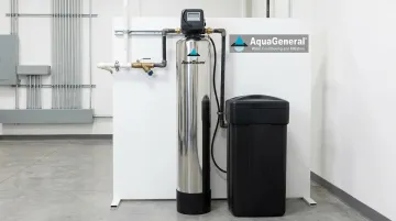 AquaGuard whole-house water conditioner system showing multi-stage filtration components