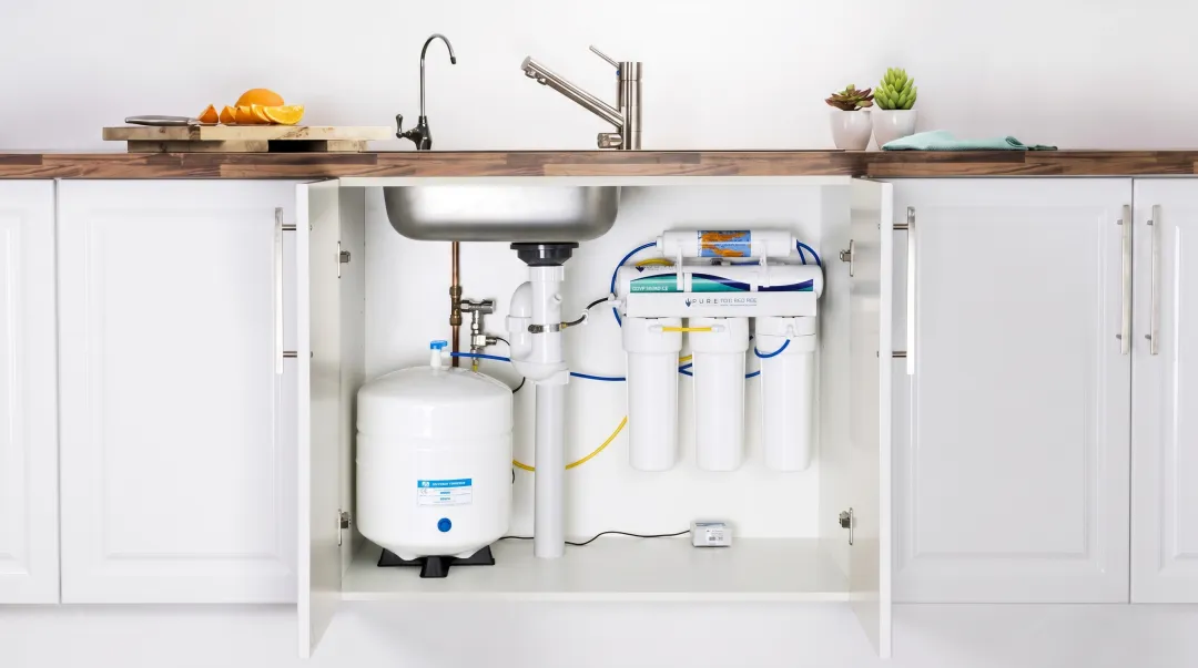 Under-sink reverse osmosis system installed filtering Houston municipal drinking water