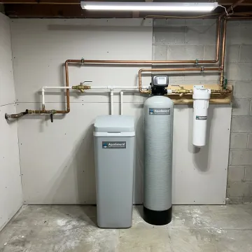 Custom water treatment system installed in a utility room
