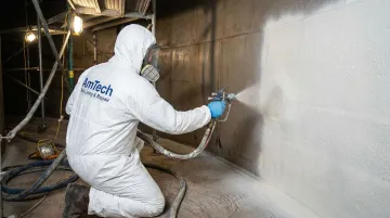 AmTech Tank Lining technician applying biodiesel-compatible interior lining during tank overhaul