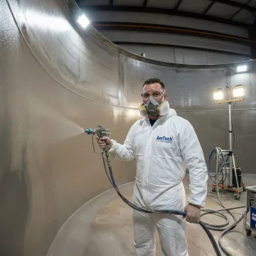 Hot water tank interior showing modern lining system application