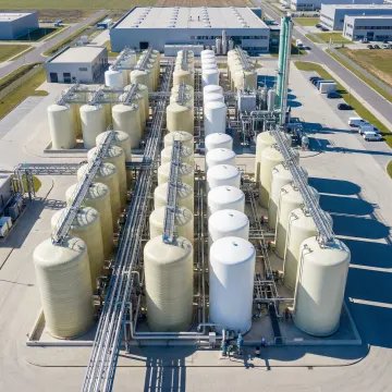 Modern FRP storage tanks in industrial facility showcasing global market infrastructure