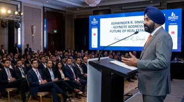 Ashwinder R Singh keynote speaking at real estate industry conference for developers