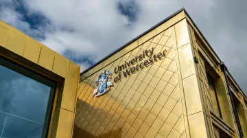 University campus modern building representing RICS-accredited real estate management school
