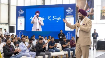 Ashwinder R. Singh delivering keynote address at real estate industry conference