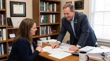 Enrolled Agent founder consulting with client on IRS audit representation