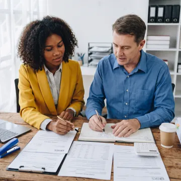 Tax professional advising a small business owner