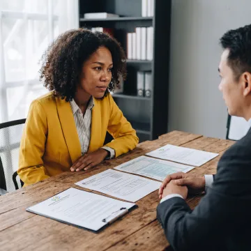Tax professional reviewing IRS compliance documents