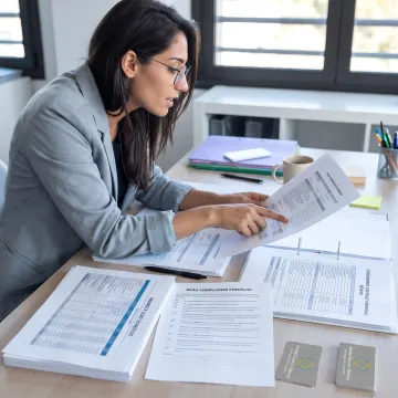 Advisor reviewing government contract cost data