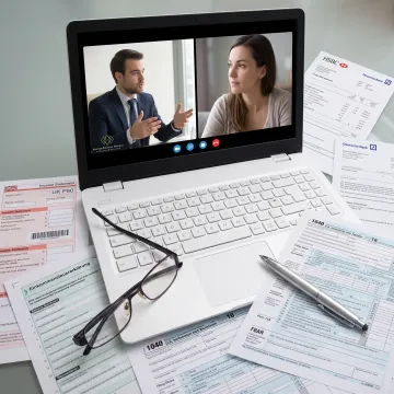 Advisor discussing U.S. expat tax documents