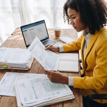 Tax consultant reviewing financial documents