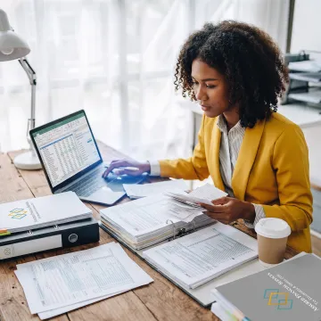 Tax advisor organizing business tax records
