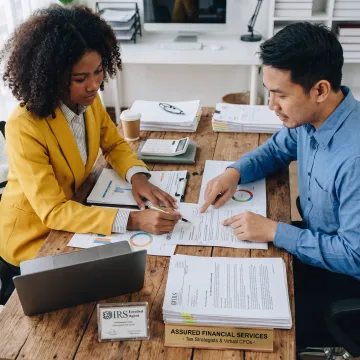 Tax professional reviewing IRS resolution documents
