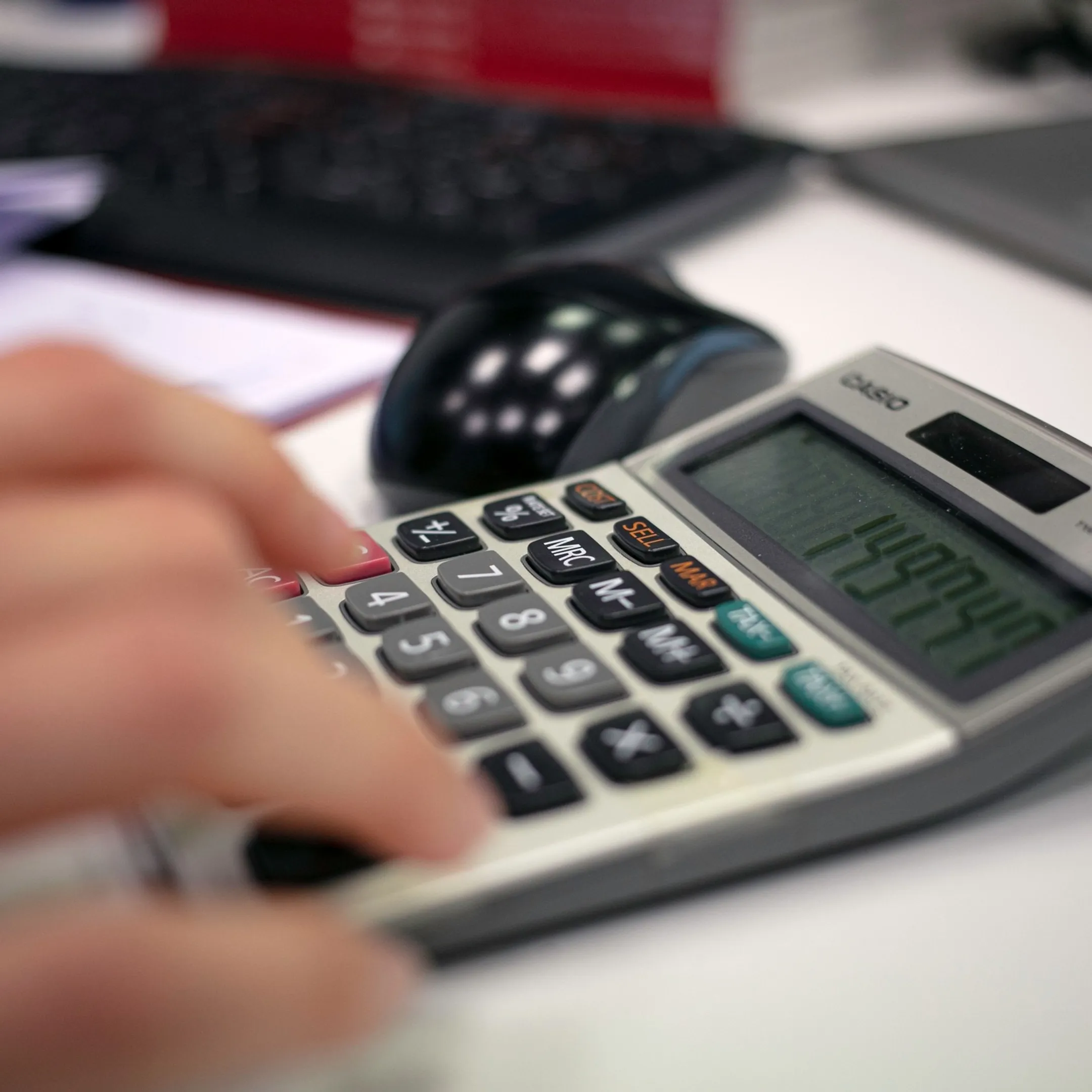 Tax advisor sorting client filing records