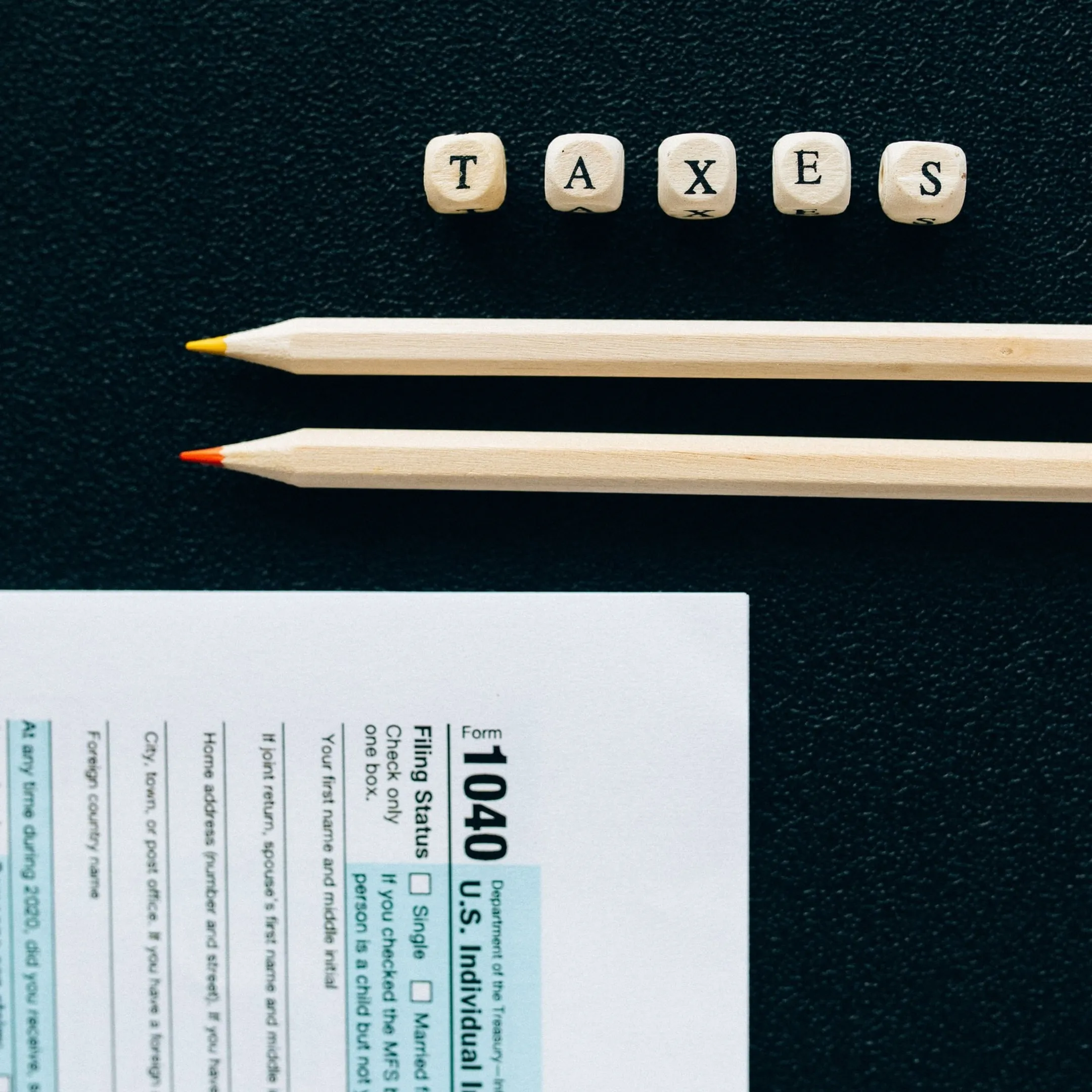 Tax professional going through business tax records