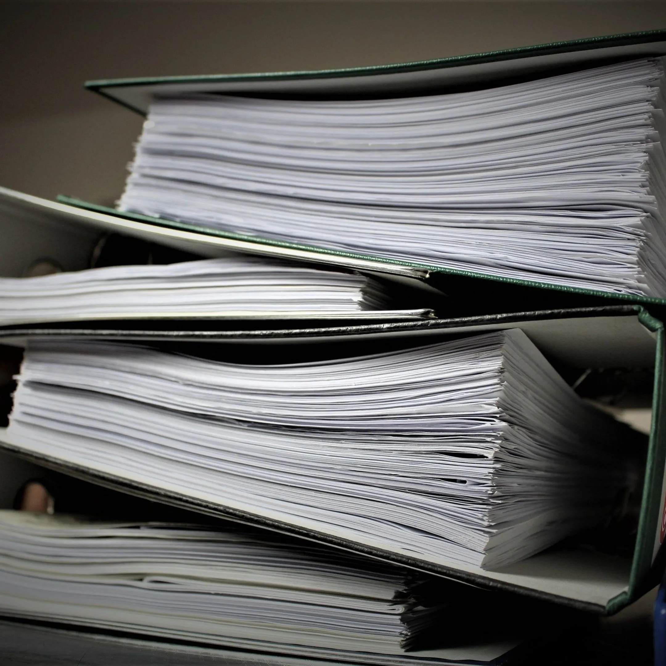 Tax professional arranging IRS resolution paperwork