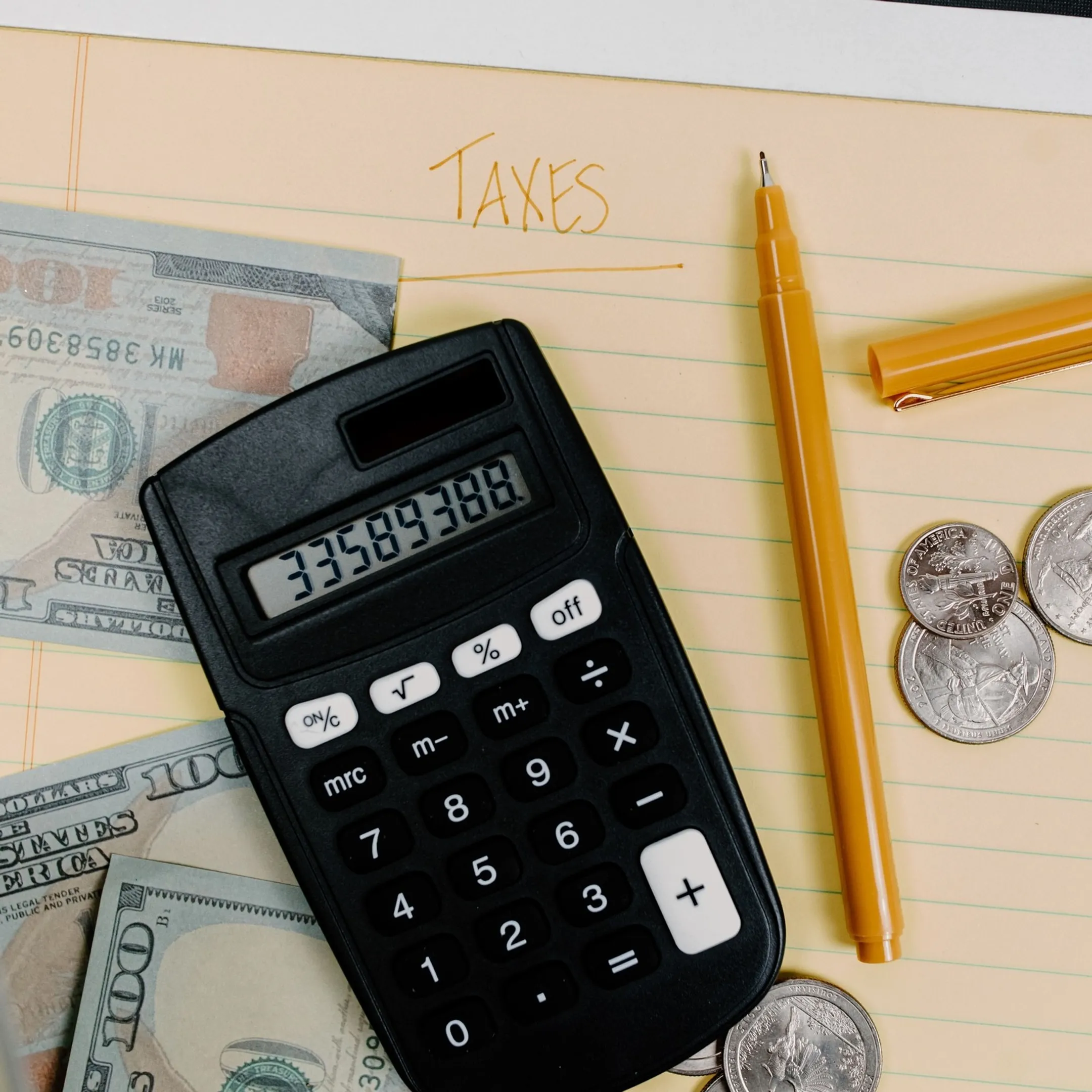 Tax advisor reviewing return documents with client