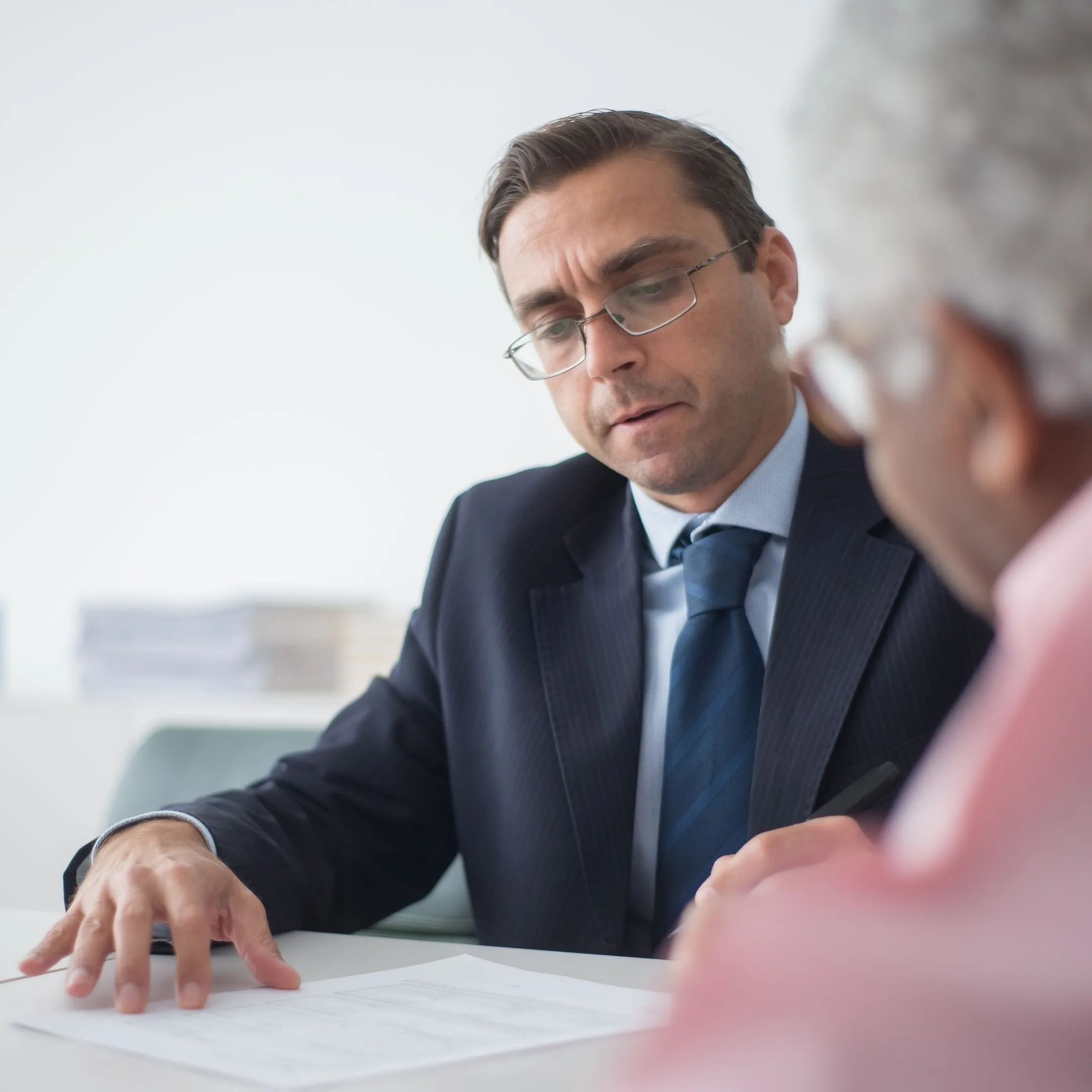 Advisor talking through tax planning with business clients