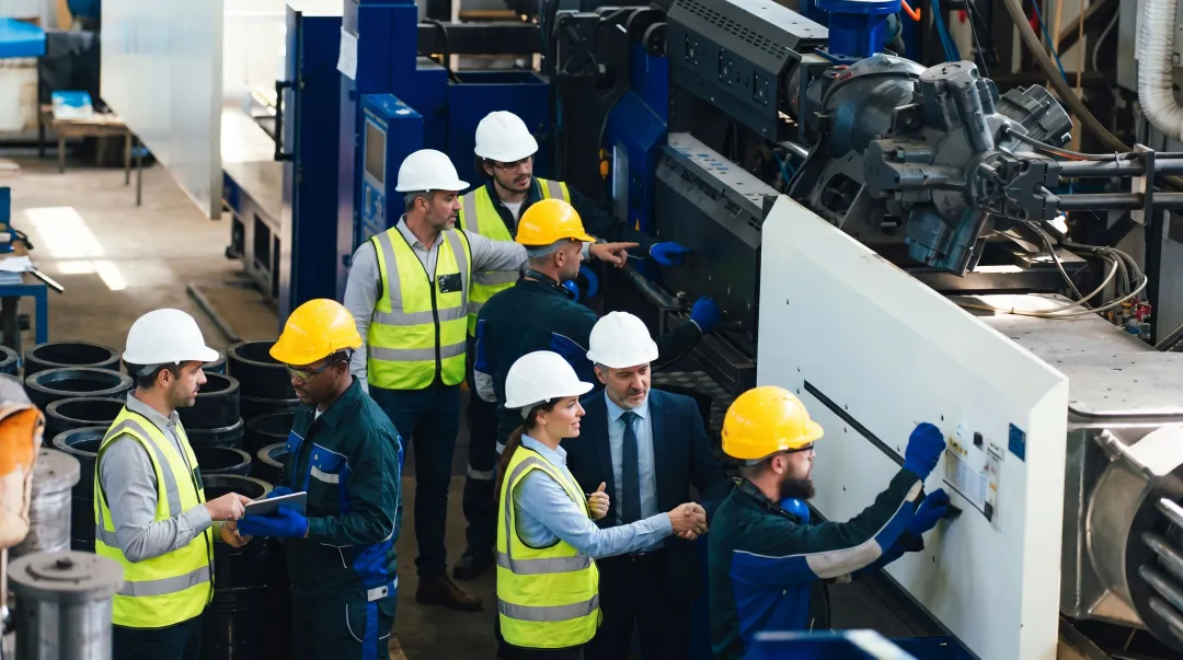 ADI behavioral safety consulting team working with frontline manufacturing employees on site