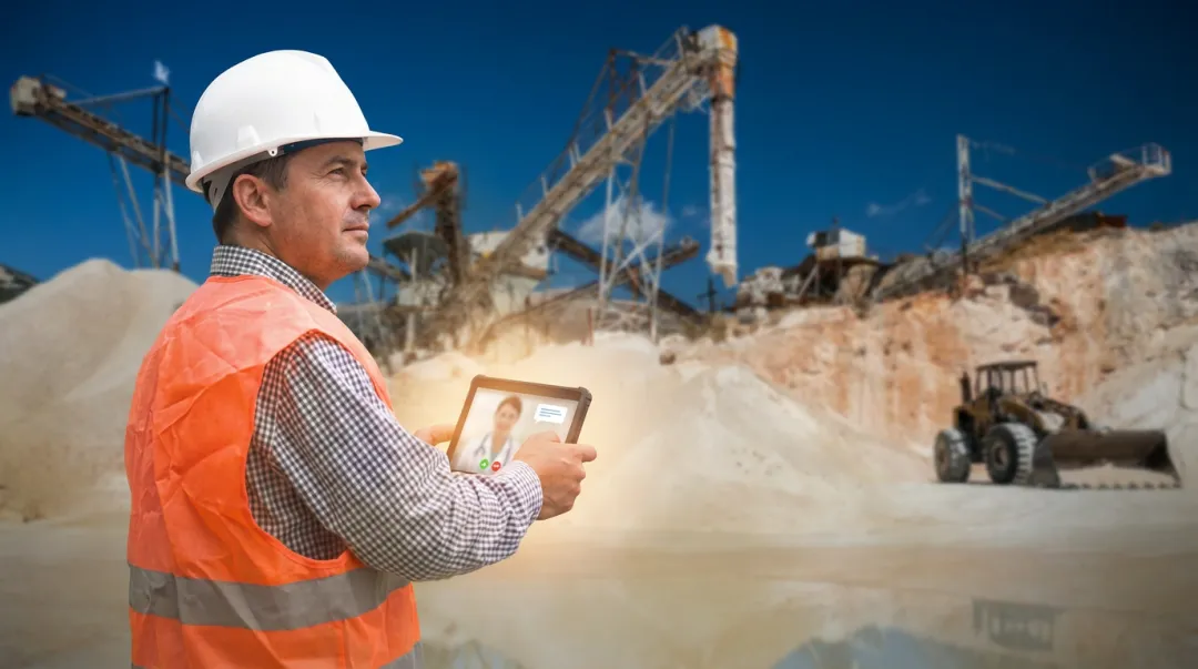 Remote mining site worker accessing telehealth mental health support on tablet device