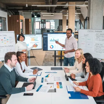 Consultants leading organizational change workshop