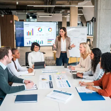 Consultants leading an organizational change workshop