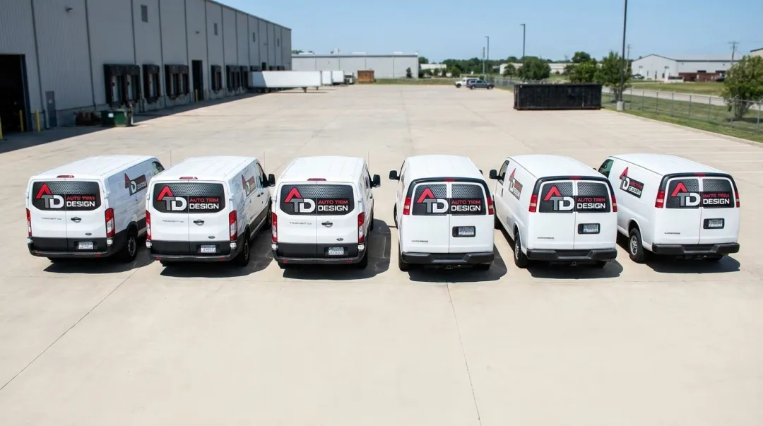Fleet of branded vehicles with consistent perforated window film graphics across regions