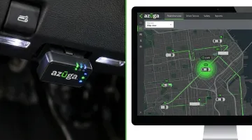 Azuga OBD-II tracker device installed showing live fleet dashboard interface