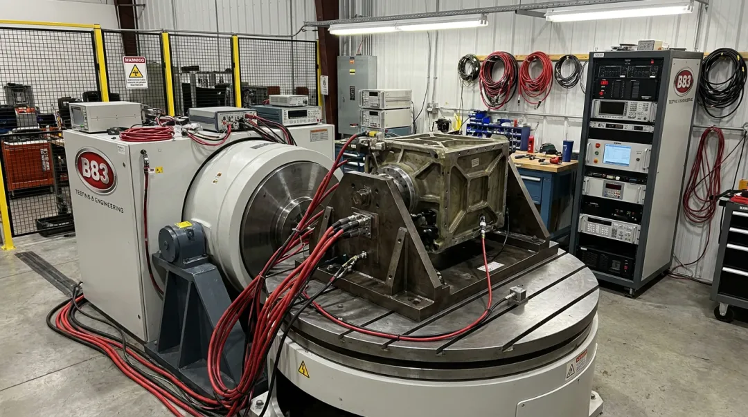 Electro-dynamic shaker system testing heavy equipment for shock ruggedness verification