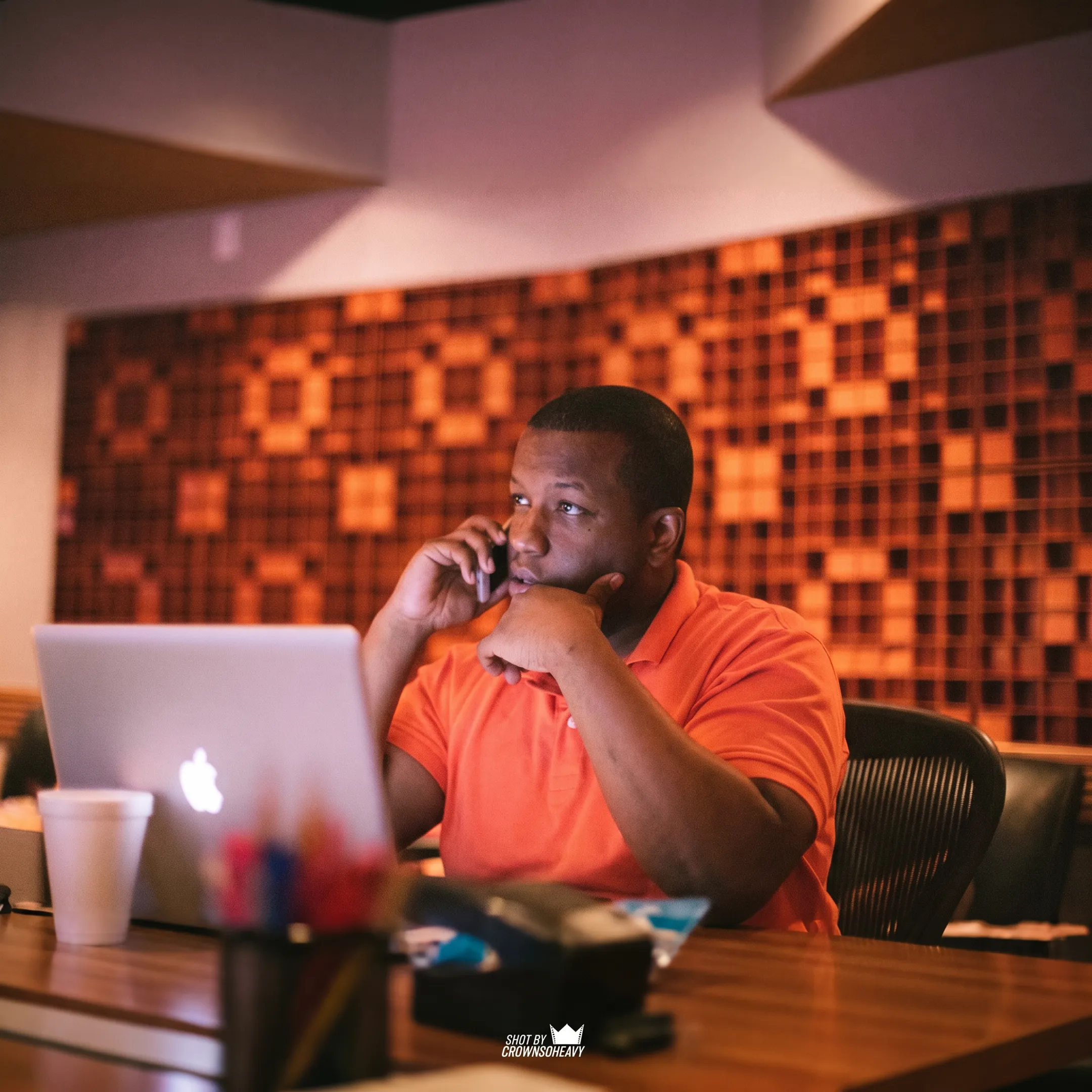 Artist reviewing a music promotion strategy with a consultant