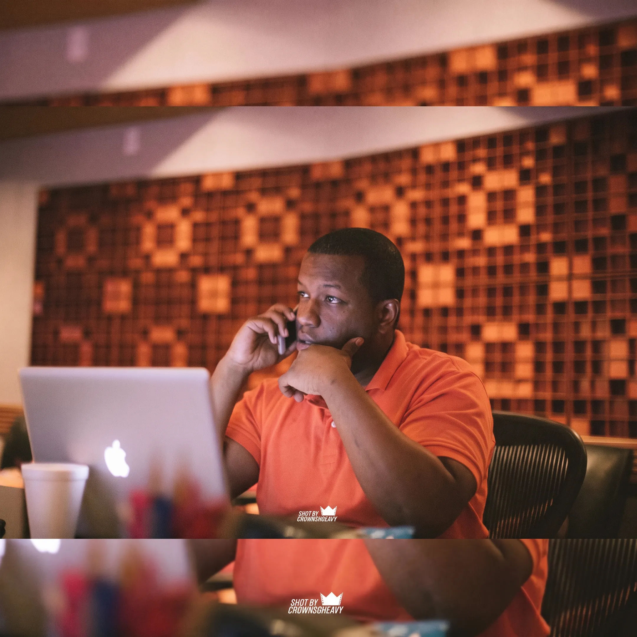 Creative director discussing personal branding strategy in a conference room