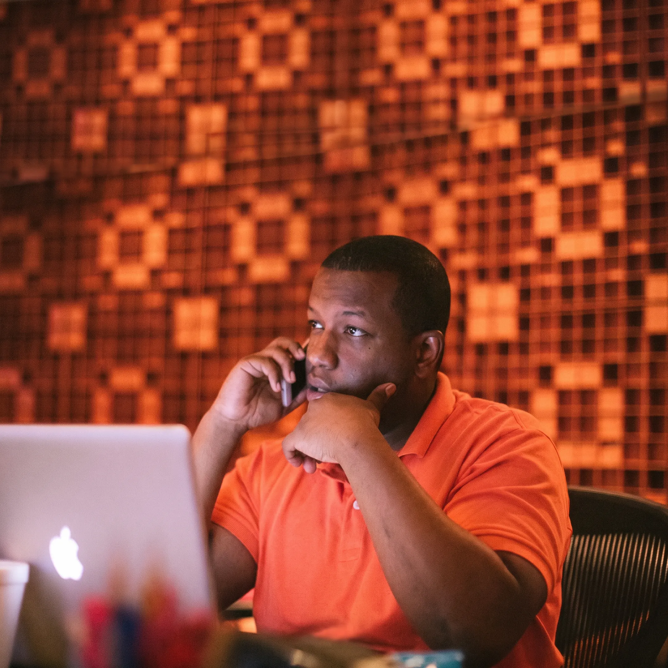 Artist reviewing music video marketing strategy on a screen