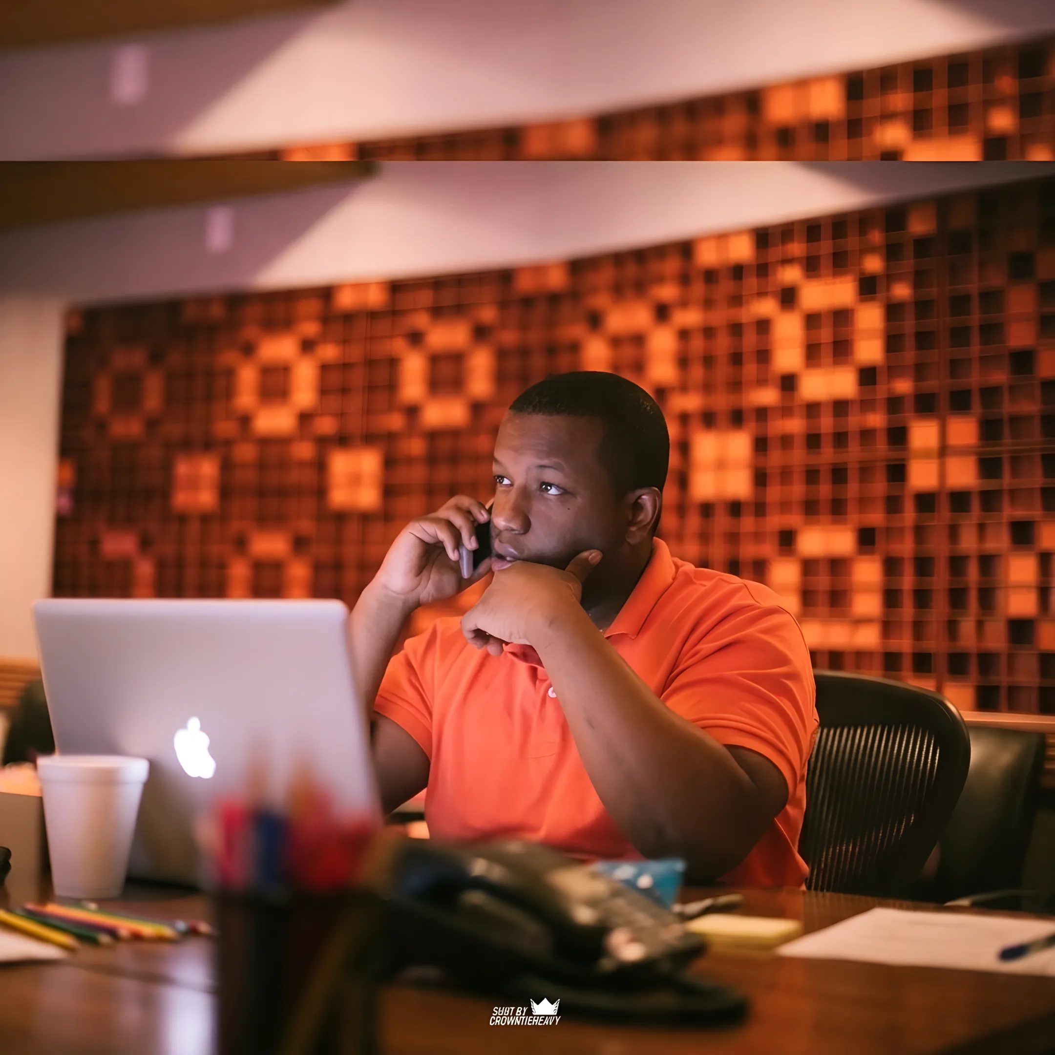 Music executive analyzing campaign analytics and tour routing schedules on a laptop