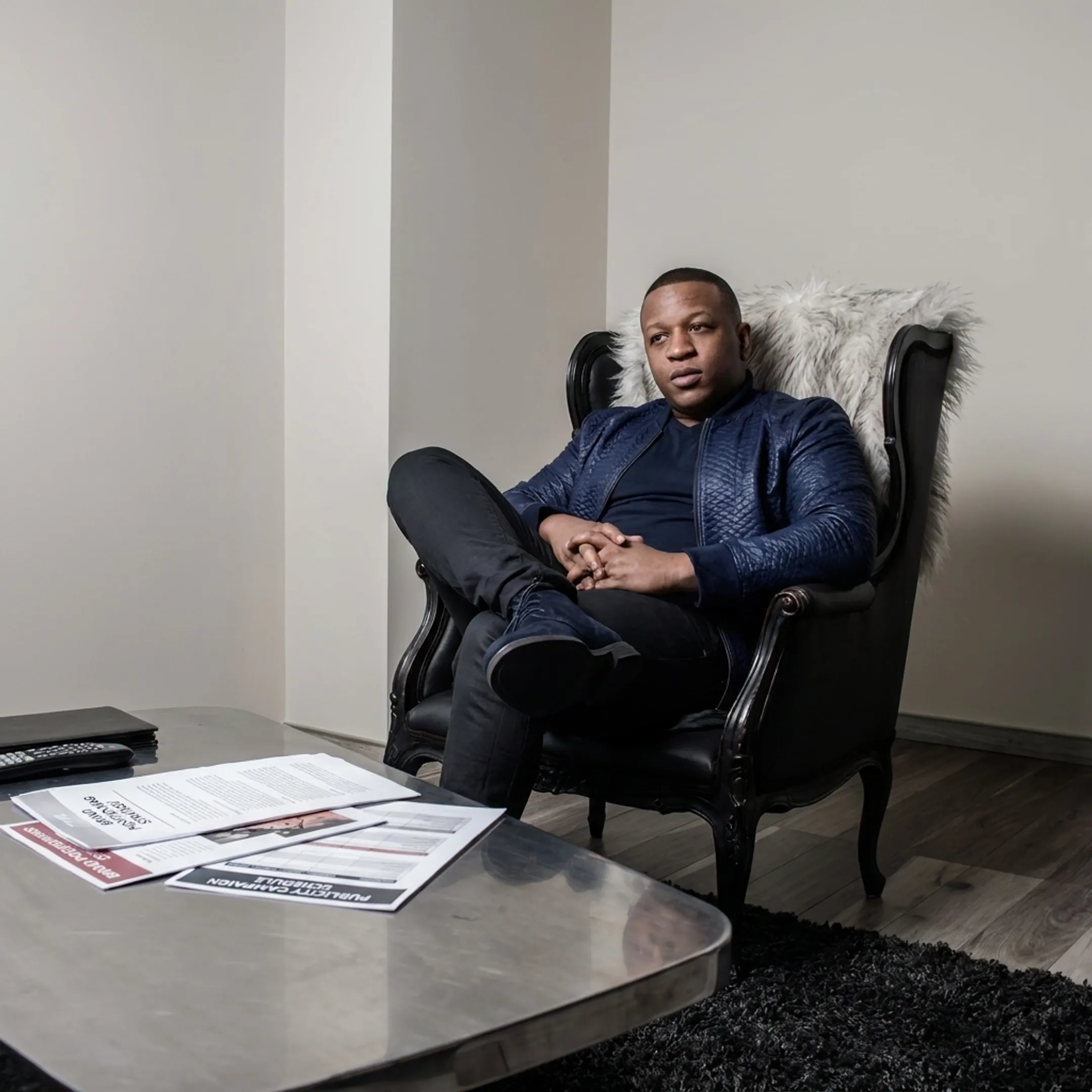 Executive reviewing strategic personal branding and media planning documents