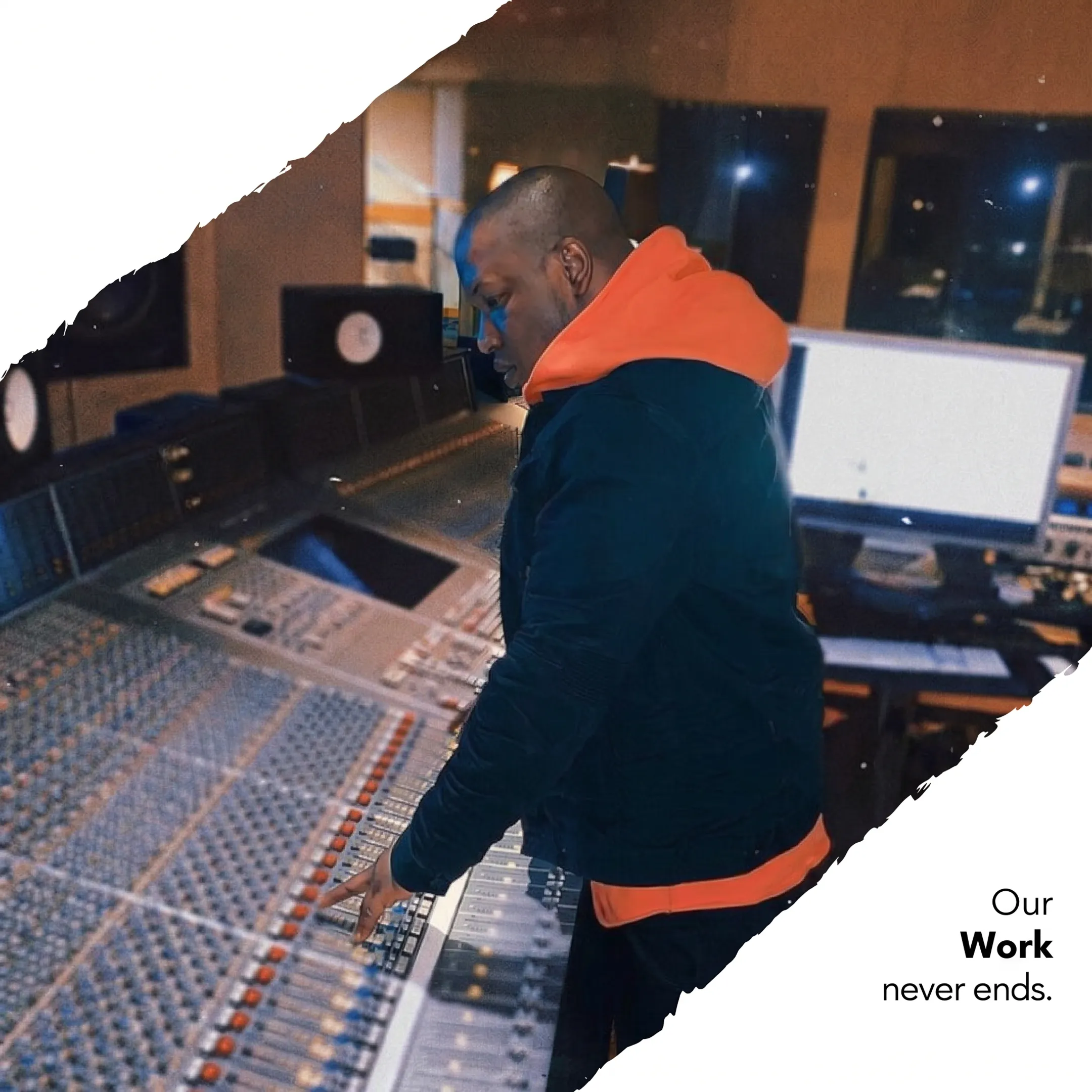 Music executive and artist reviewing business contracts in a recording studio