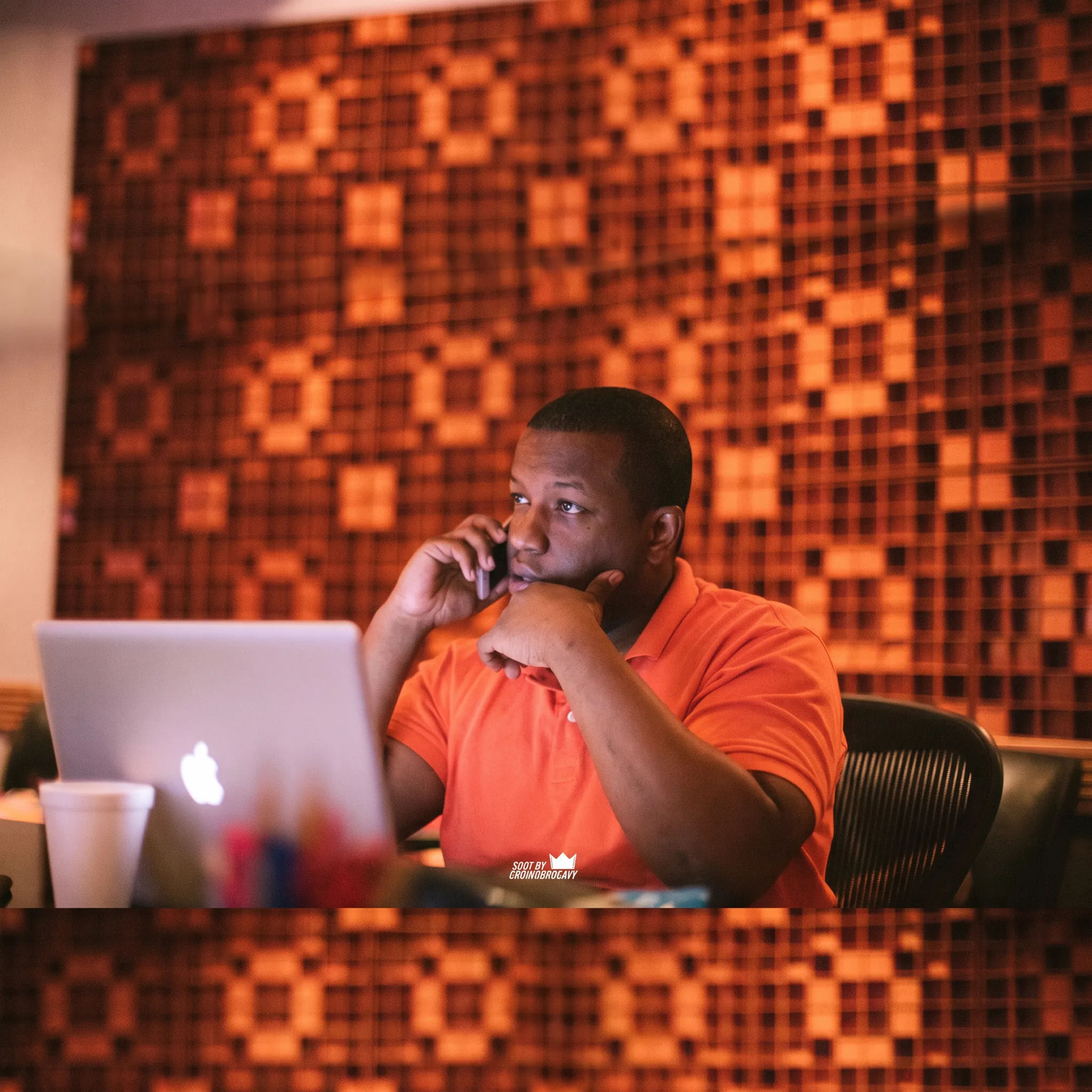 Music executive conducting a music business coaching consultation in a recording studio setting