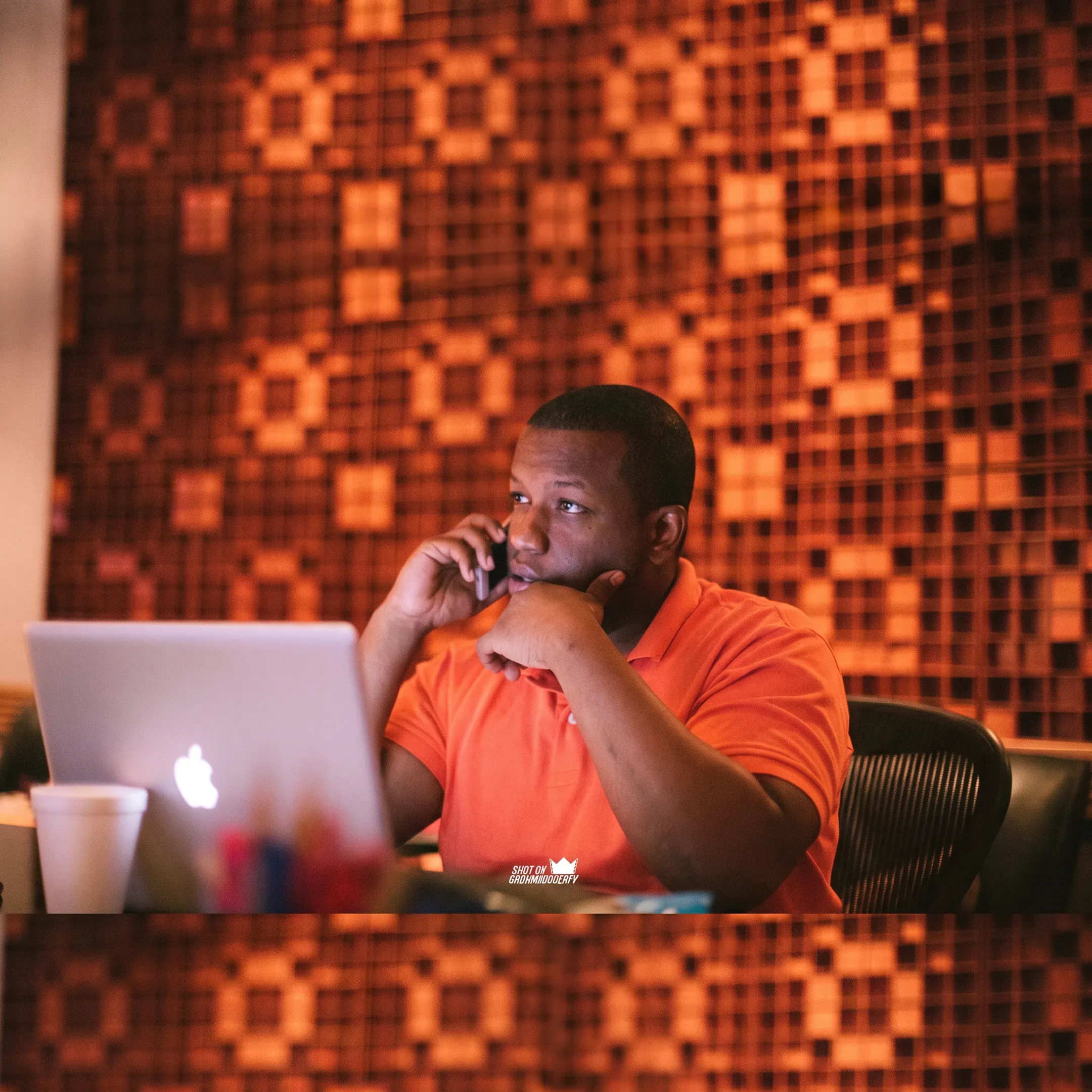 Music artist engaging in a professional press interview and studio media campaign