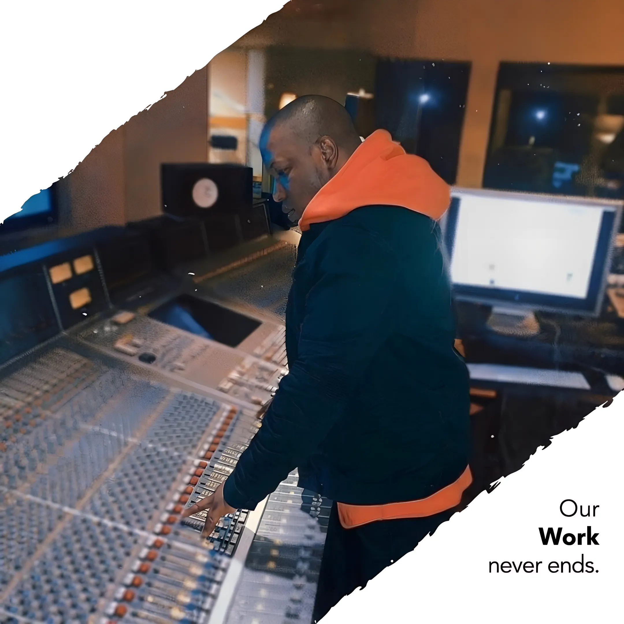 Audio engineer and artist reviewing tracks in a professional recording studio.