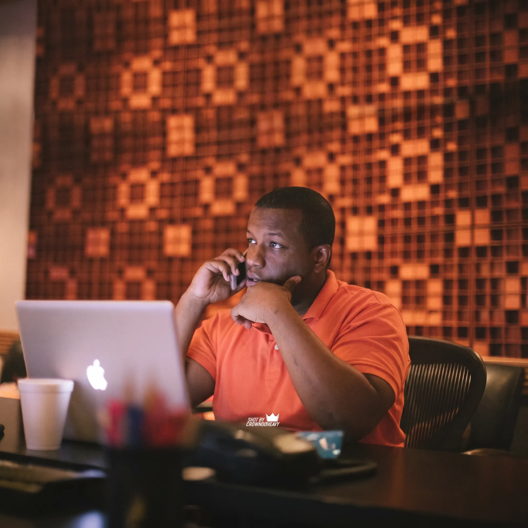Music marketing consultant collaborating in a professional recording studio