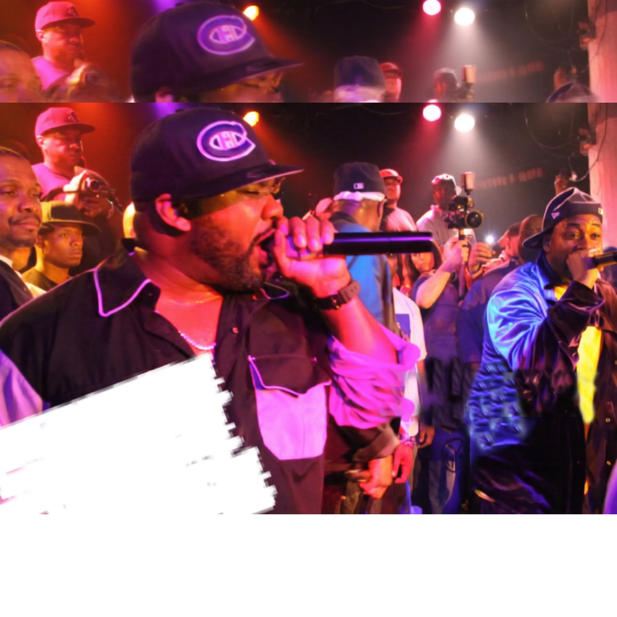 Independent artist performing on stage under concert lighting