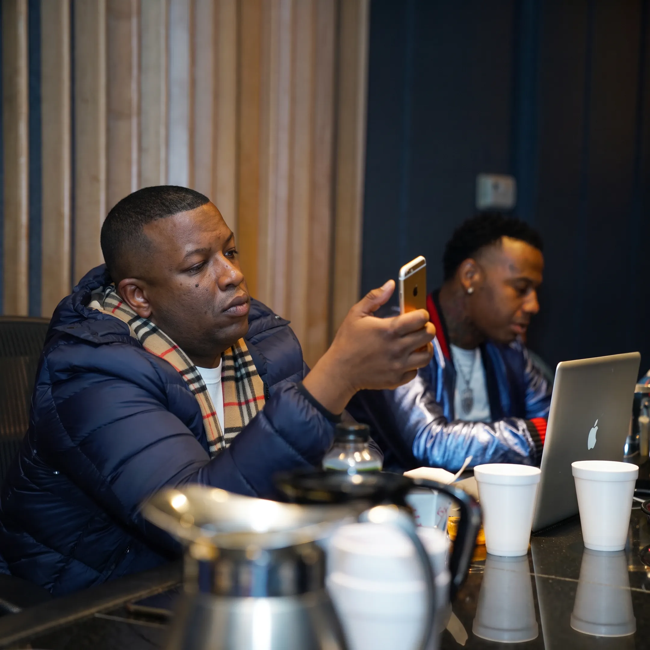 Music manager meeting with an artist in a Nashville studio