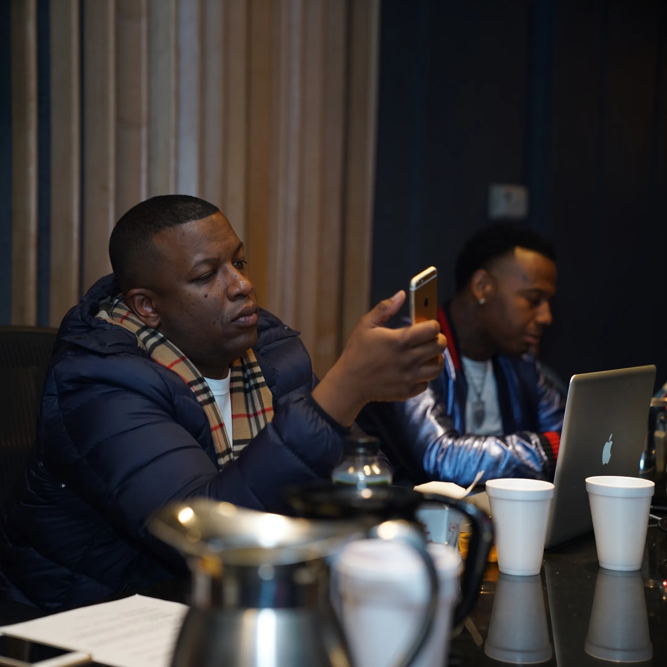 Artist and music promotion manager reviewing a campaign plan
