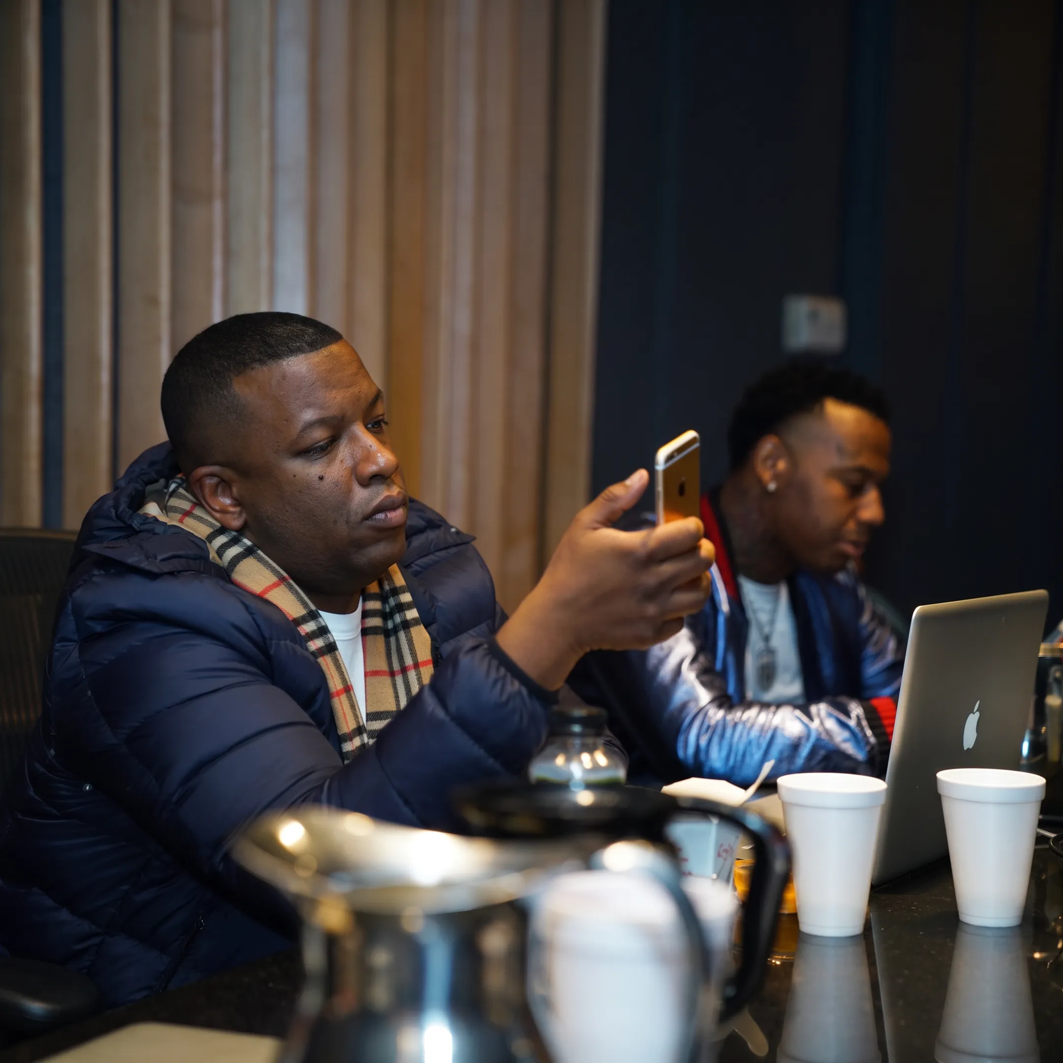 Artist and booking professional discussing a live performance opportunity