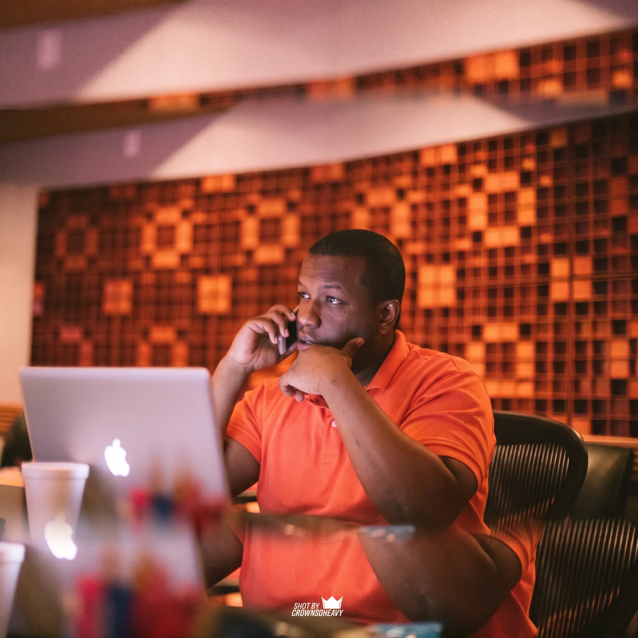 Creative director developing an entertainment marketing campaign with artist branding and promotional materials