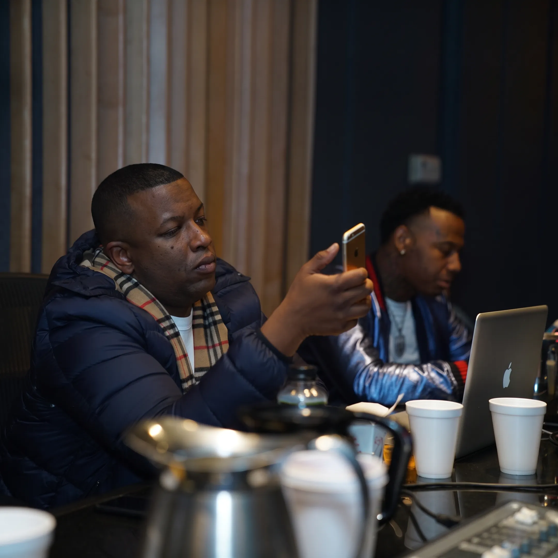 Music industry professionals discussing an artist career strategy in a Nashville studio
