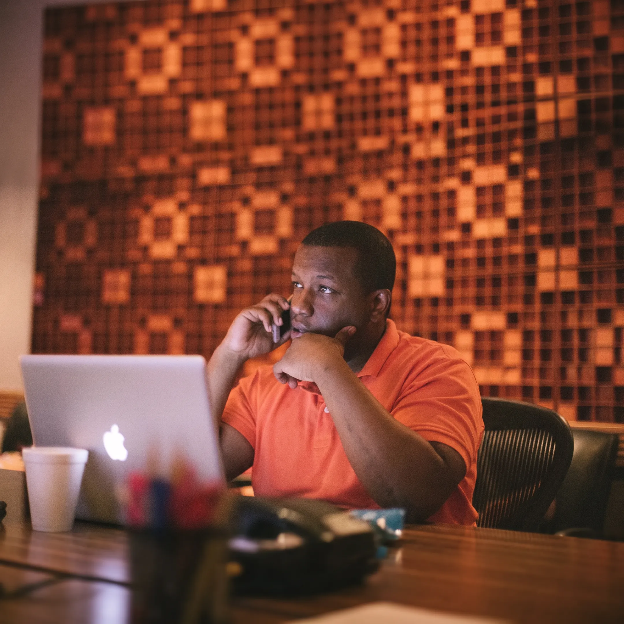 Music manager reviewing an artist strategy with a performer in a Nashville studio