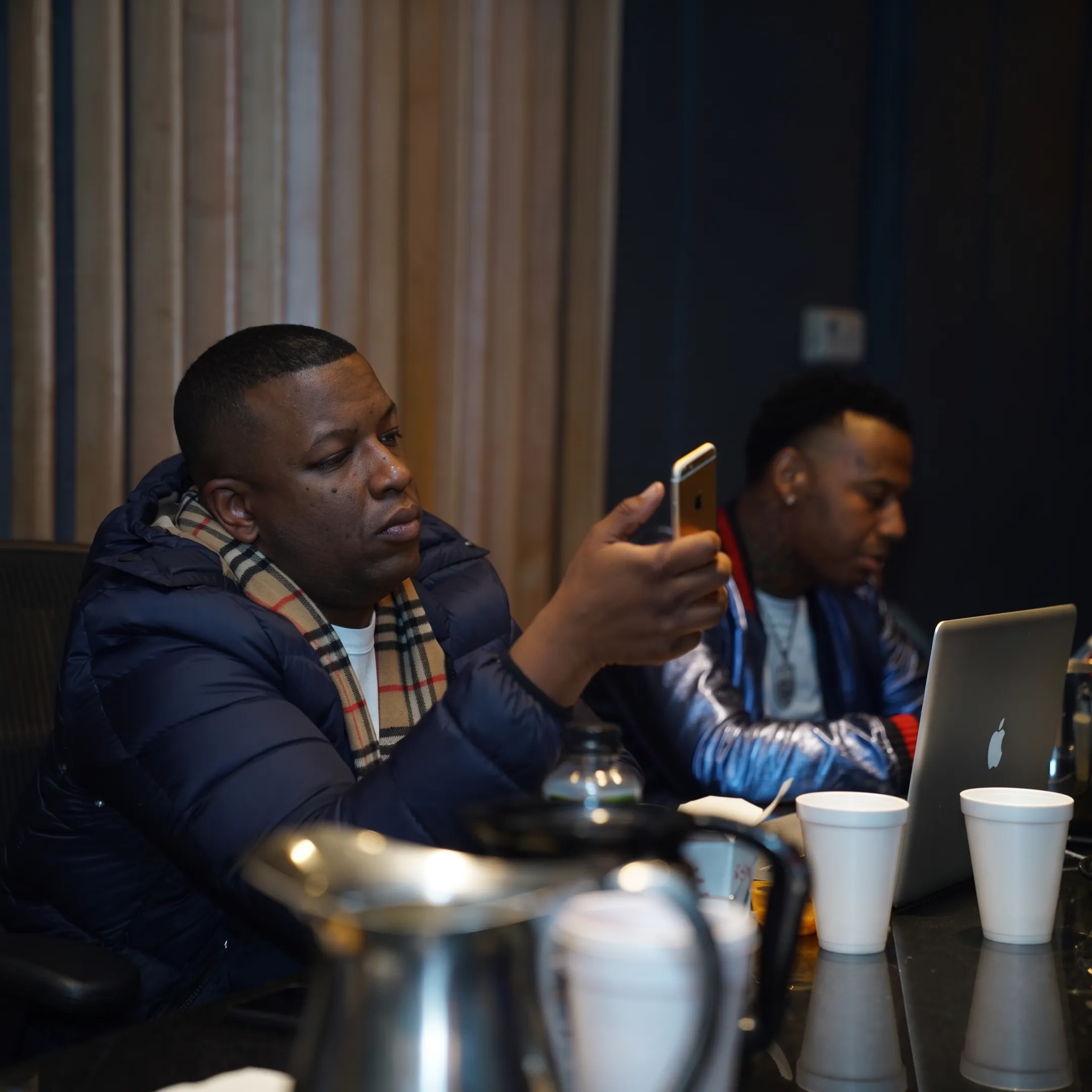 Entertainment strategist reviewing an artist campaign with a client